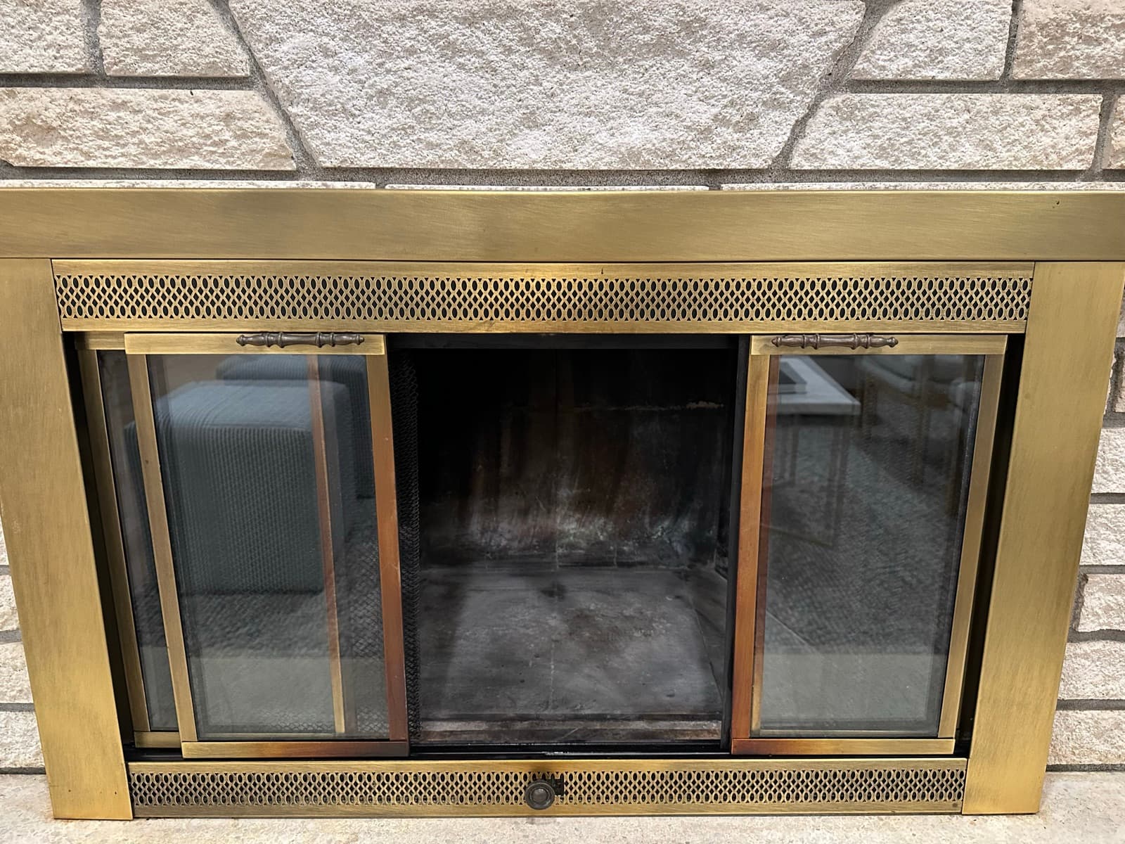 Home Cleaning in Tacoma, WA — Living Room after cleaning: Polished brass, glass scrubbed, firebox cleared