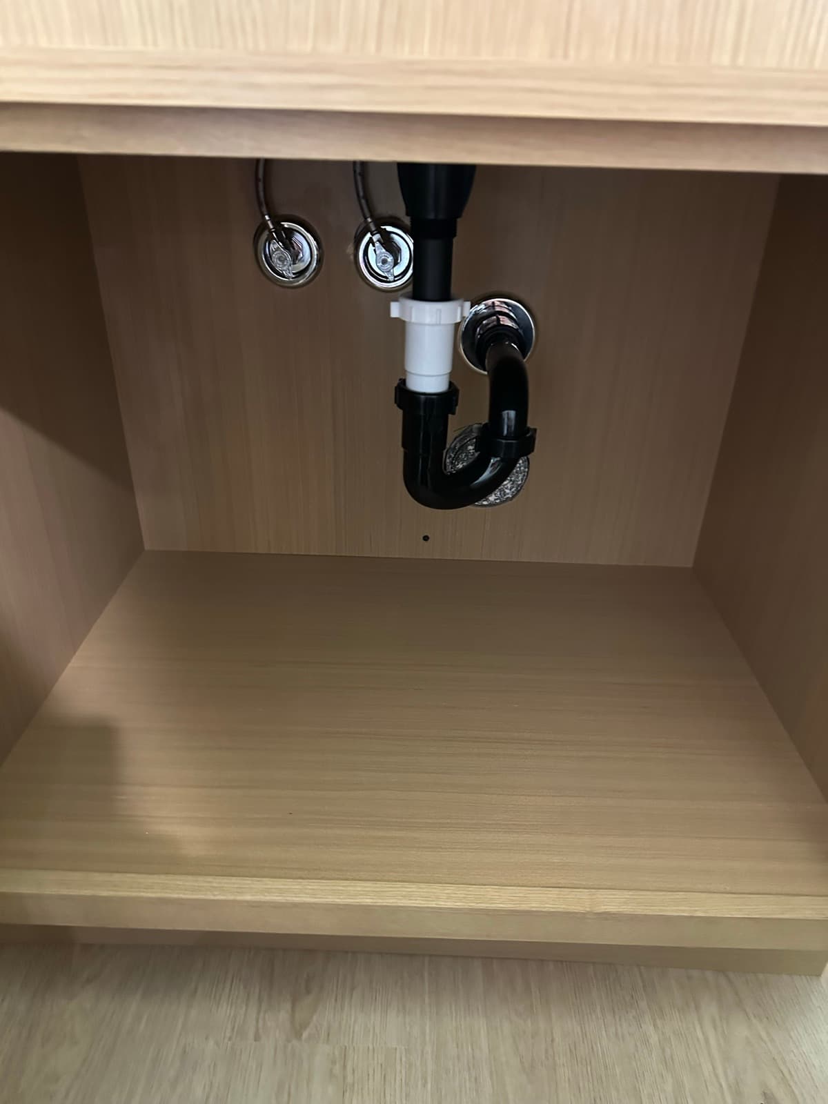Home Cleaning in Renton, WA — Kitchen after cleaning: Cabinet wiped, plumbing polished