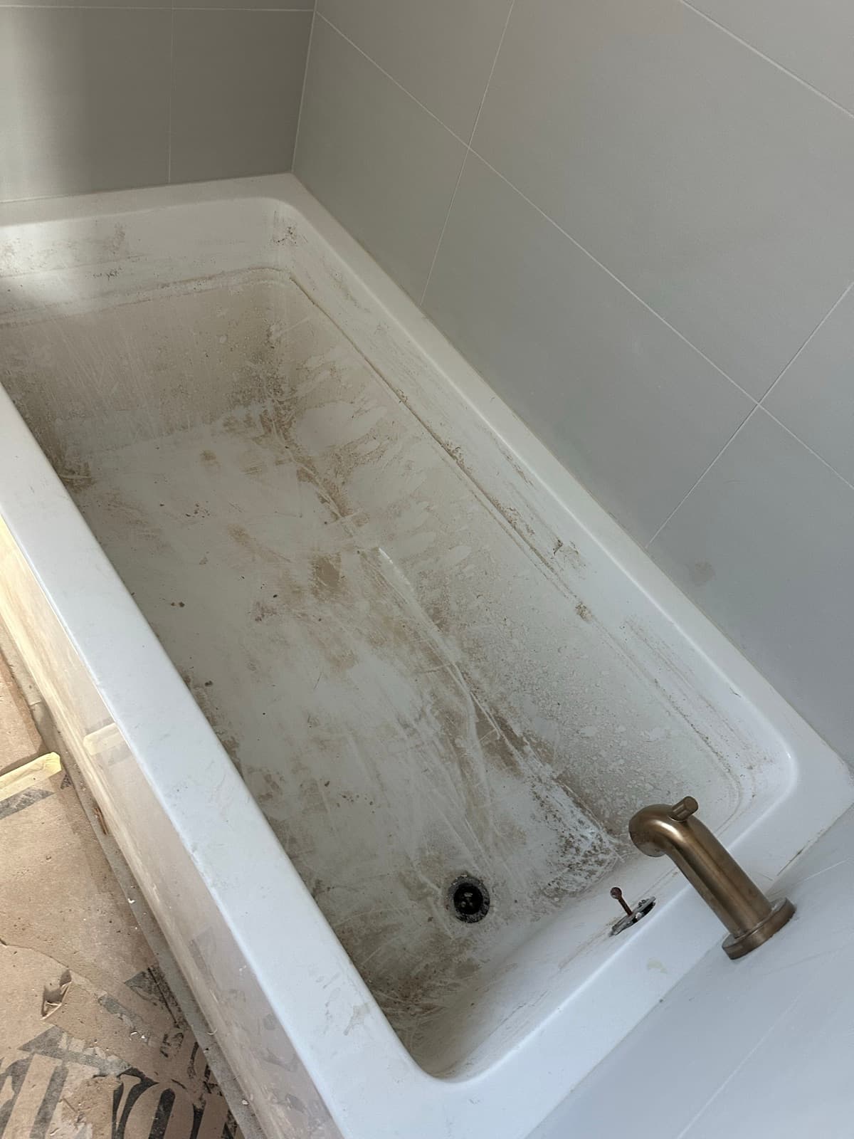 Home Cleaning in Auburn, WA — Bathroom before cleaning: Hard-water stains, soap scum, dingy basin