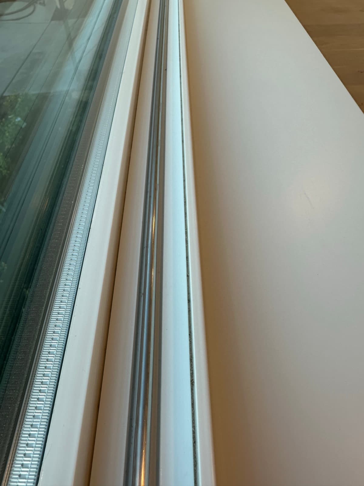 Home Cleaning in Federal Way, WA — Window after cleaning: Track scraped, vacuumed, wiped clean