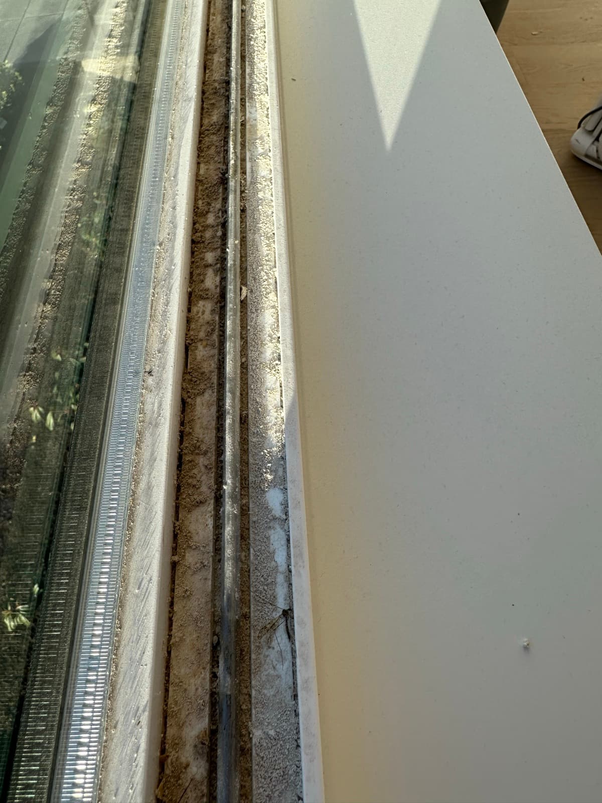 Home Cleaning in Federal Way, WA — Window before cleaning: Black grime, insect debris, lint