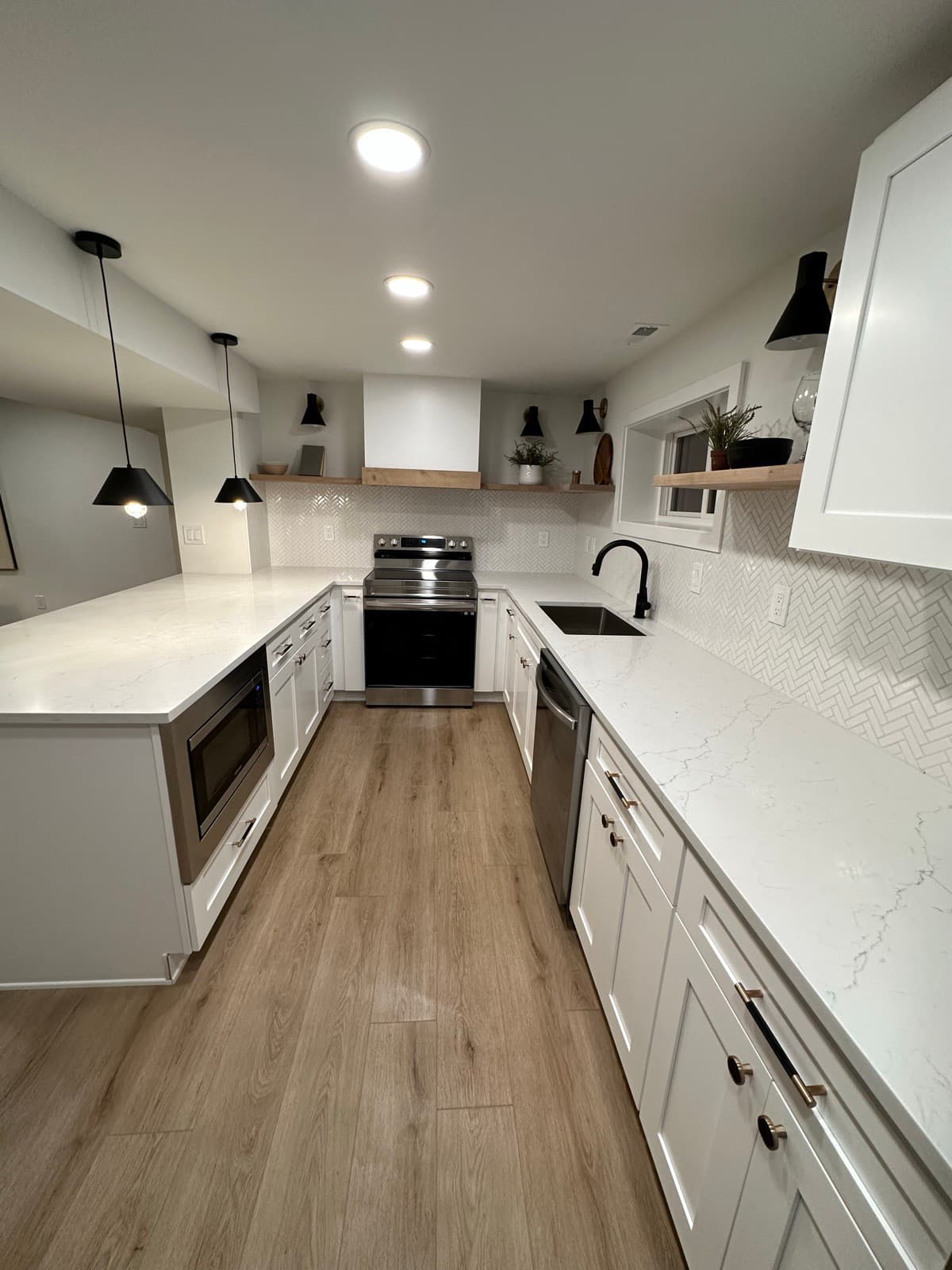 Post-Construction in Bellevue, WA — Kitchen after cleaning: Three-pass clean — floors polished, surfaces detailed