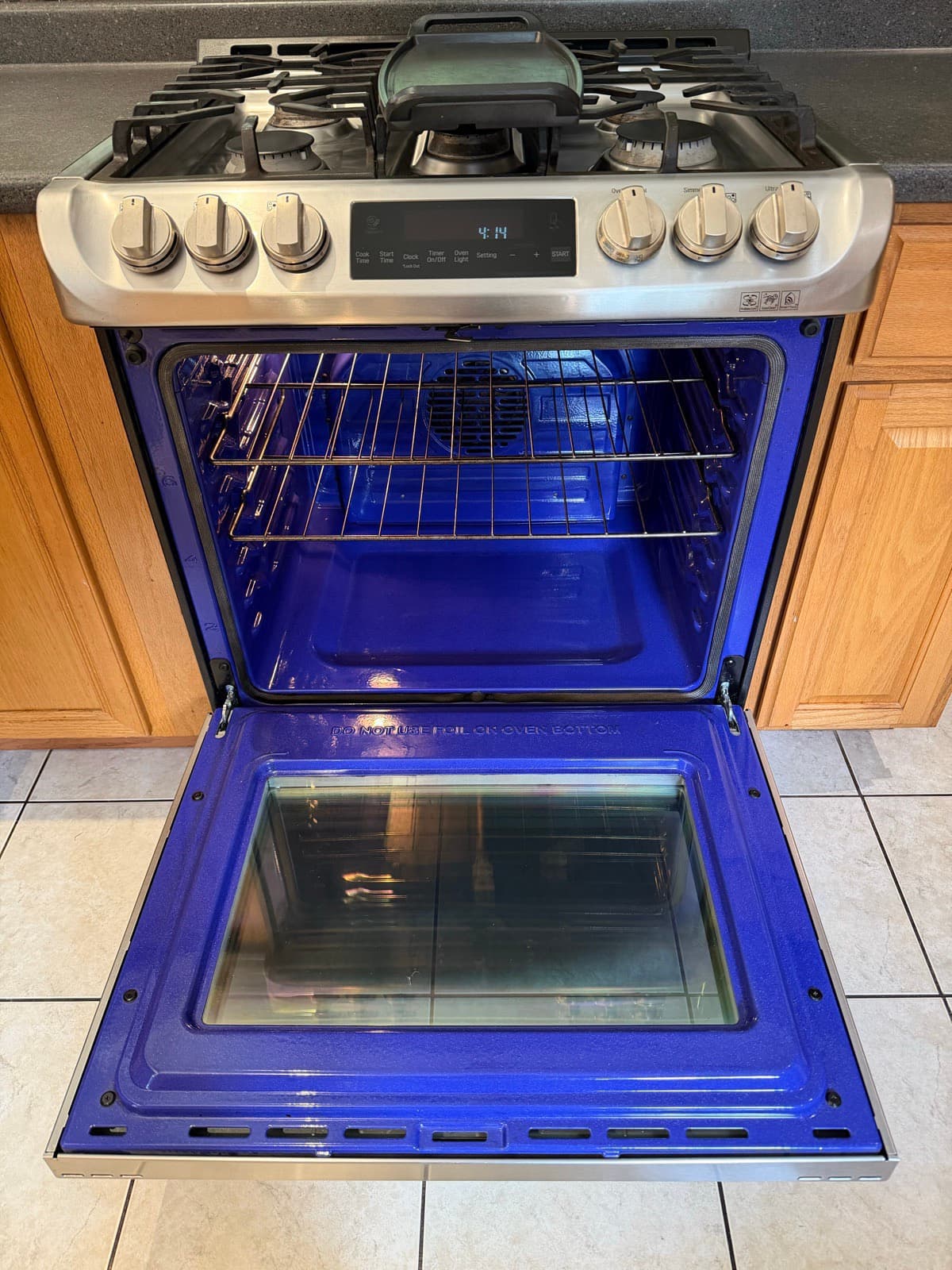 Home Cleaning in Federal Way, WA — Kitchen after cleaning: Cobalt enamel restored, racks like new