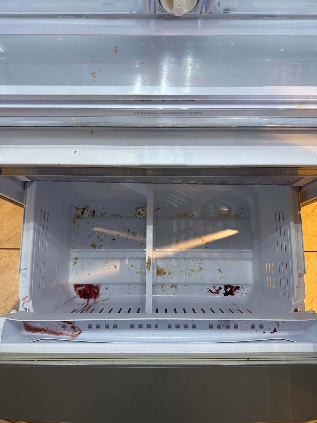 Home Cleaning in Seattle, WA — Kitchen before cleaning: Crumbs, sticky residue, dust on vents