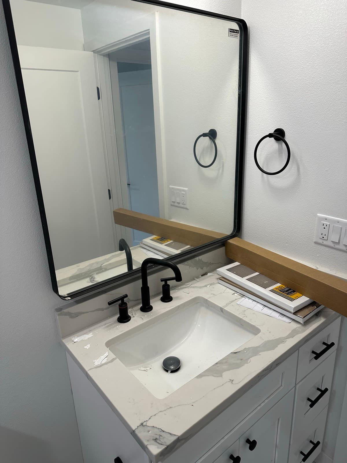 Home Cleaning in Bellevue, WA — Bathroom before cleaning: Toothpaste splatter, water marks